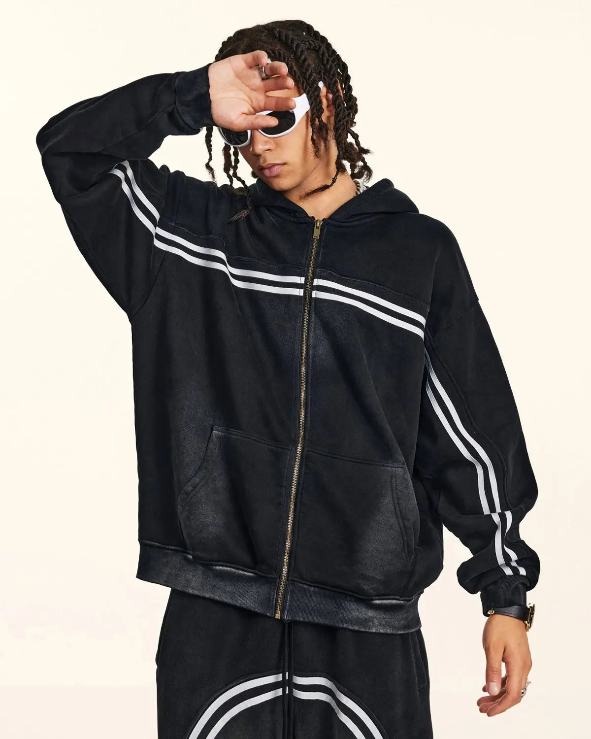 Black striped zip-up hoodie with hood and front pockets