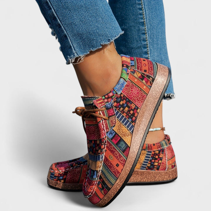 Patterned canvas lace-up trainers with a speckled flatform sole