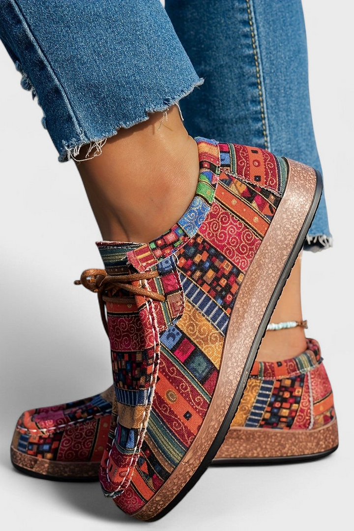 Patterned canvas lace-up trainers with a speckled flatform sole