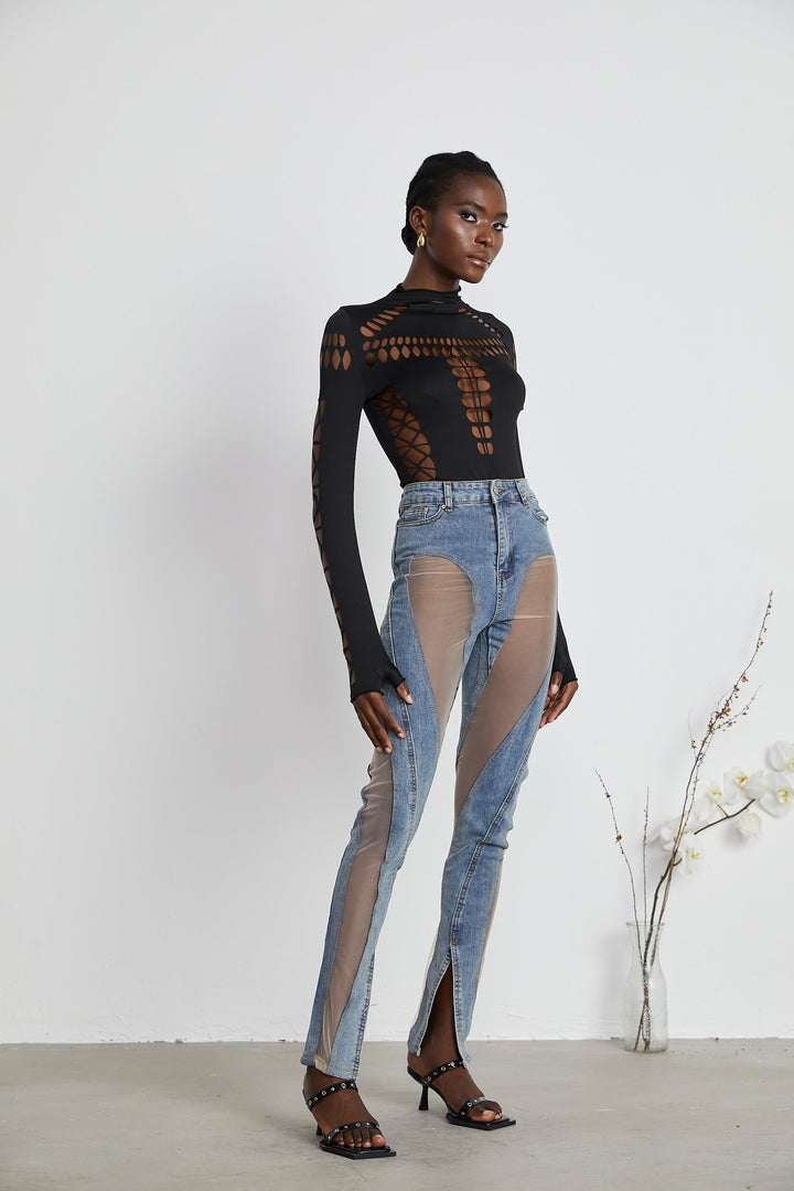 Women's blue jeans with sheer mesh panels at hips and thighs, high rise, fitted silhouette