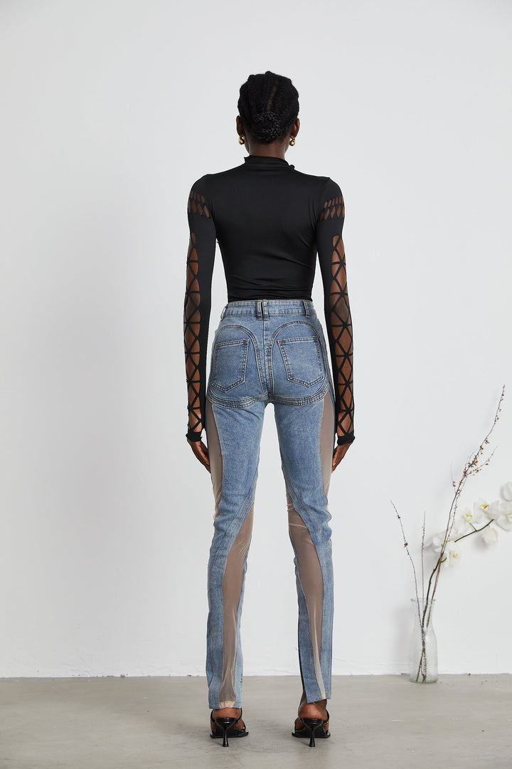 Women's blue jeans with sheer mesh panels at hips and thighs, high rise, fitted silhouette