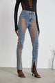 Women's blue jeans with sheer mesh panels at hips and thighs, high rise, fitted silhouette