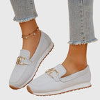 Orthopedic loafer sneakers with round toes and metal buckle detail