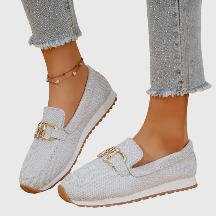 Orthopedic loafer sneakers with round toes and metal buckle detail