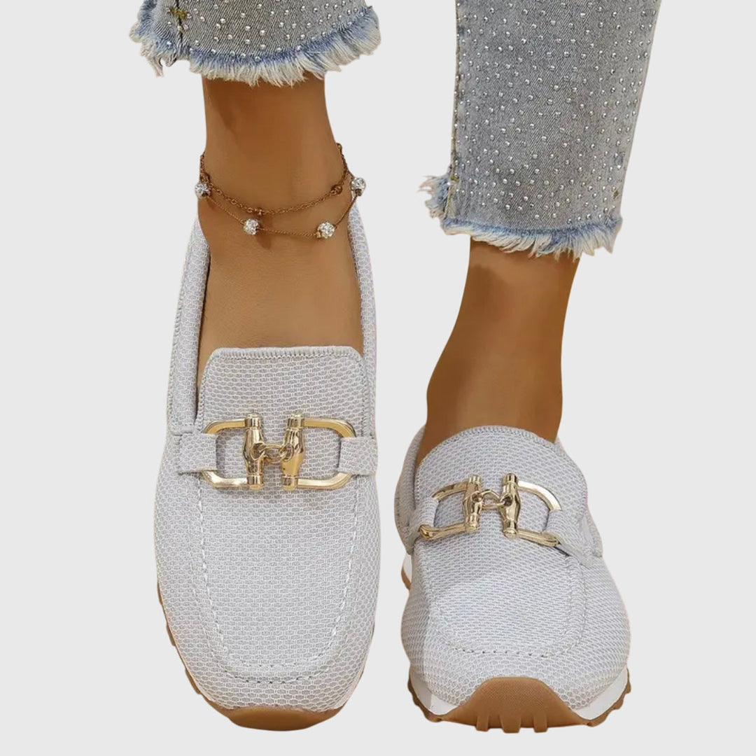 Orthopedic loafer sneakers with round toes and metal buckle detail
