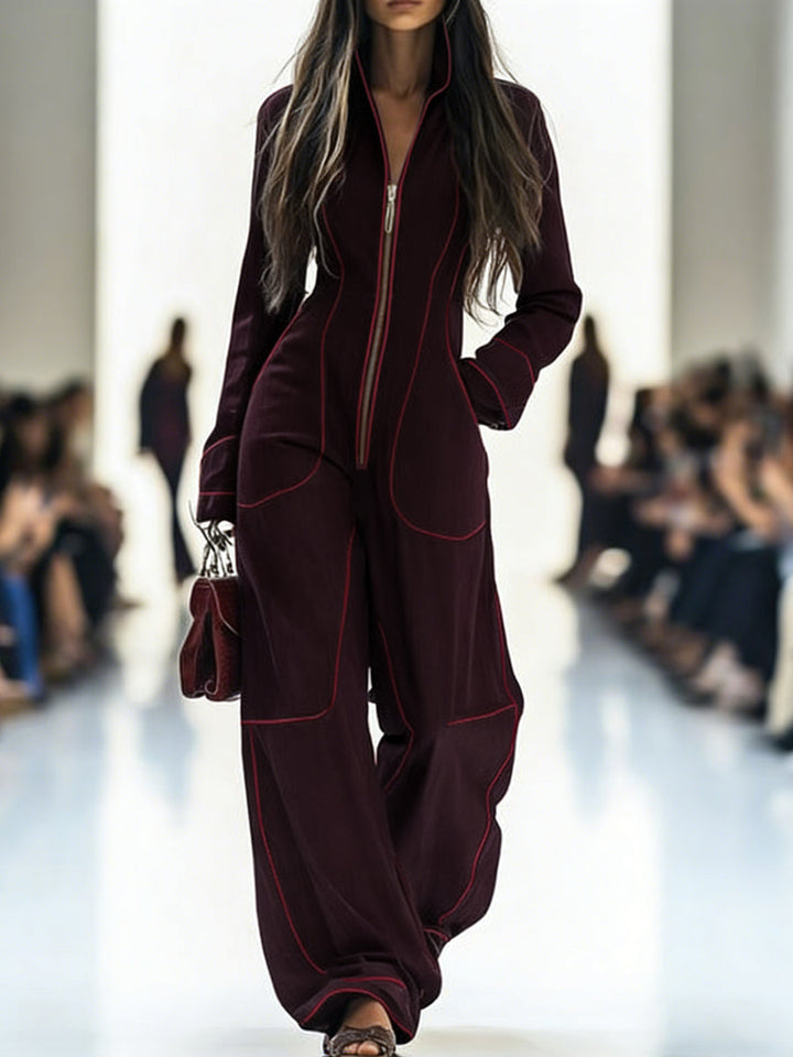 Women's wide-leg jumpsuit with stand collar and front zip, shown in burgundy and pink