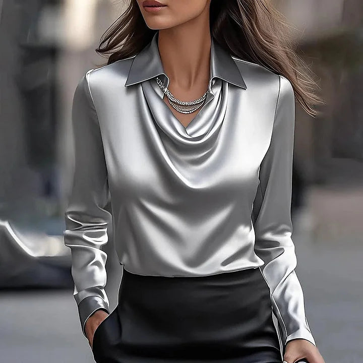 Women's shiny long-sleeve blouse with spread collar and cowl v-neck