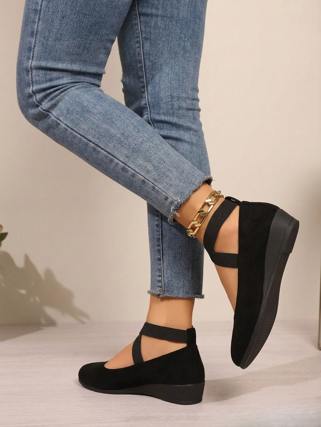 Women's black and beige closed-toe platform wedge shoes with elastic ankle strap