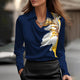 Women's shiny long-sleeve blouse with spread collar and cowl v-neck