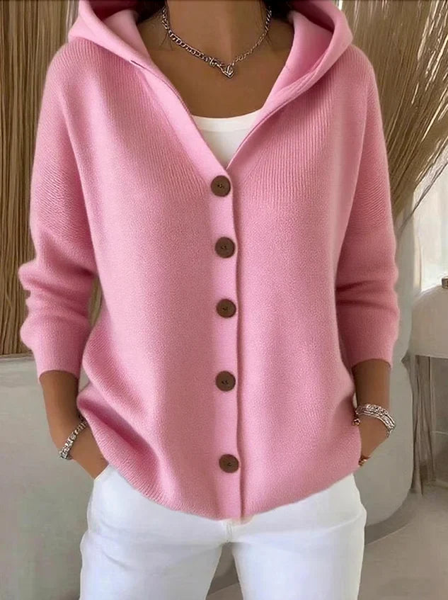 Women's pink and cream hooded cardigan with brown button front, shown in relaxed fit with pockets