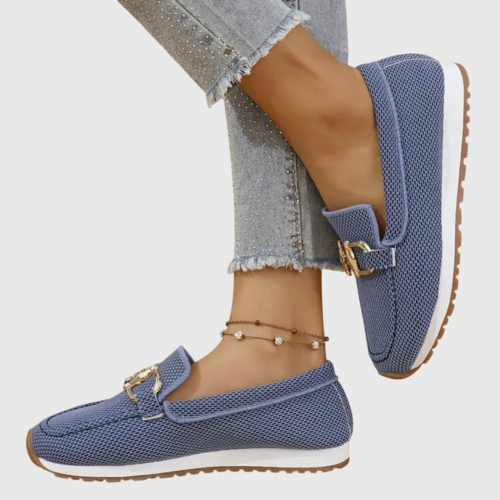 Orthopedic loafer sneakers with round toes and metal buckle detail