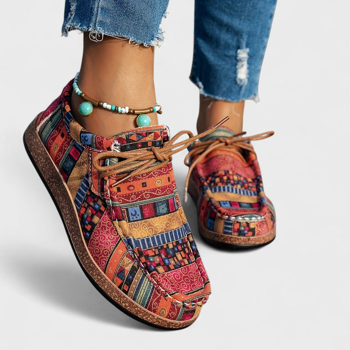 Patterned canvas lace-up trainers with a speckled flatform sole