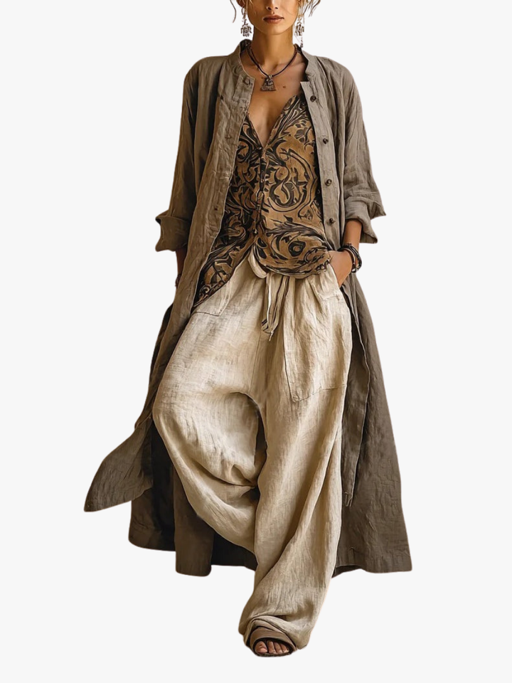 Women's three-piece set with grey-brown button shirt, patterned wrap top, and cream wide-leg trousers