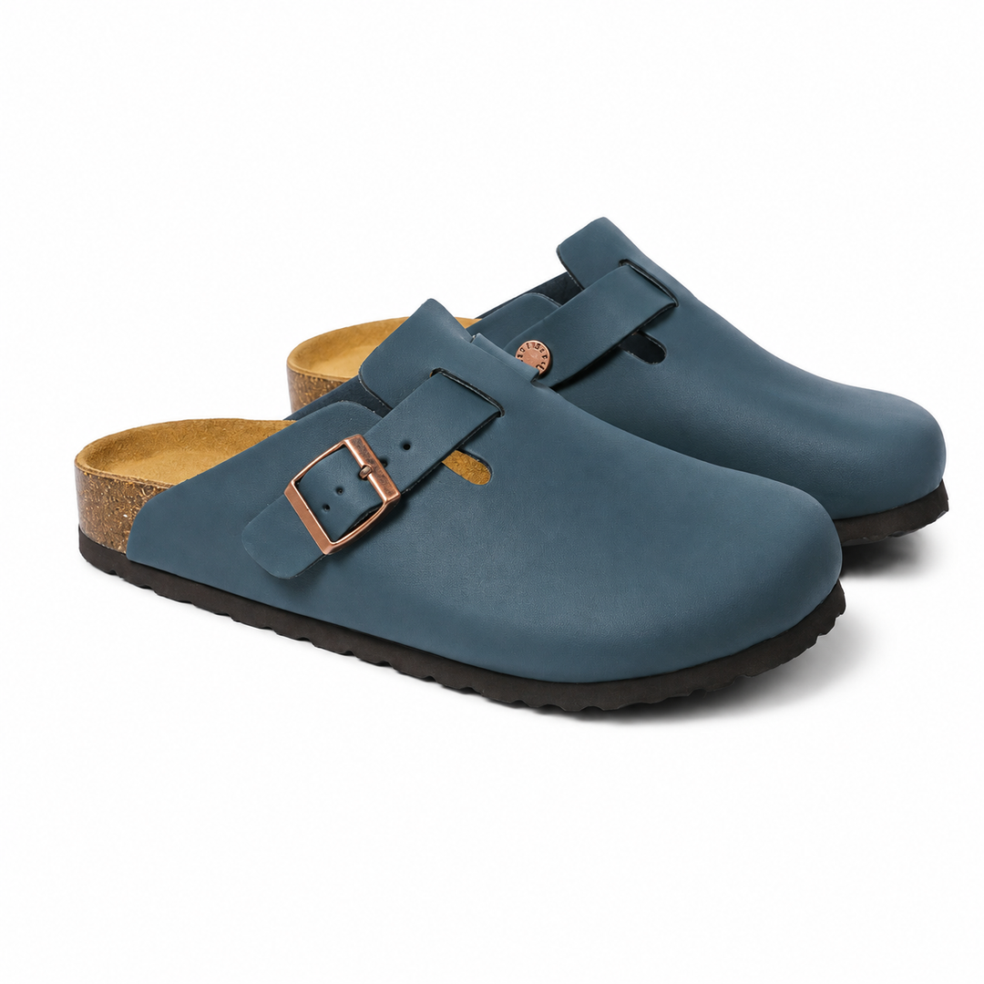 Unisex Positano clog mule with buckle strap, cork insole and black padded sole, shown in taupe and black.