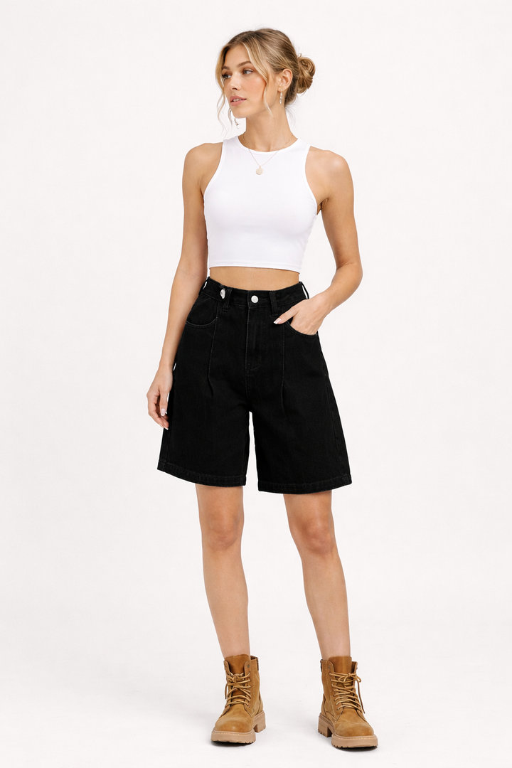 Women's high-rise wide-leg denim bermuda shorts in blue and black, shown with white tank top