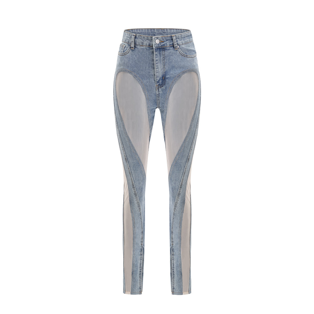 Women's blue jeans with sheer mesh panels at hips and thighs, high rise, fitted silhouette
