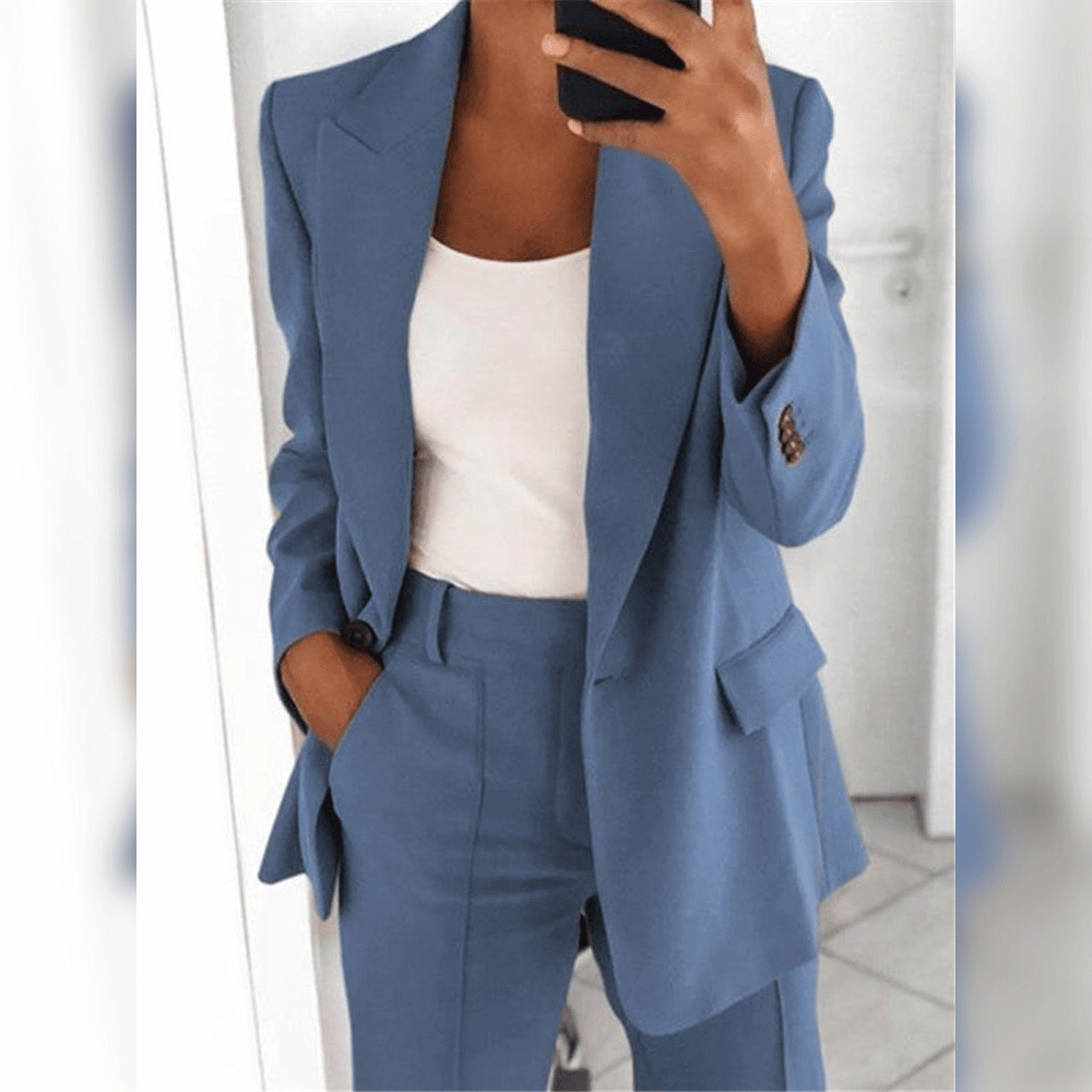 Women's two-piece tailored suit in black and blue, shown with white camisole layered underneath.