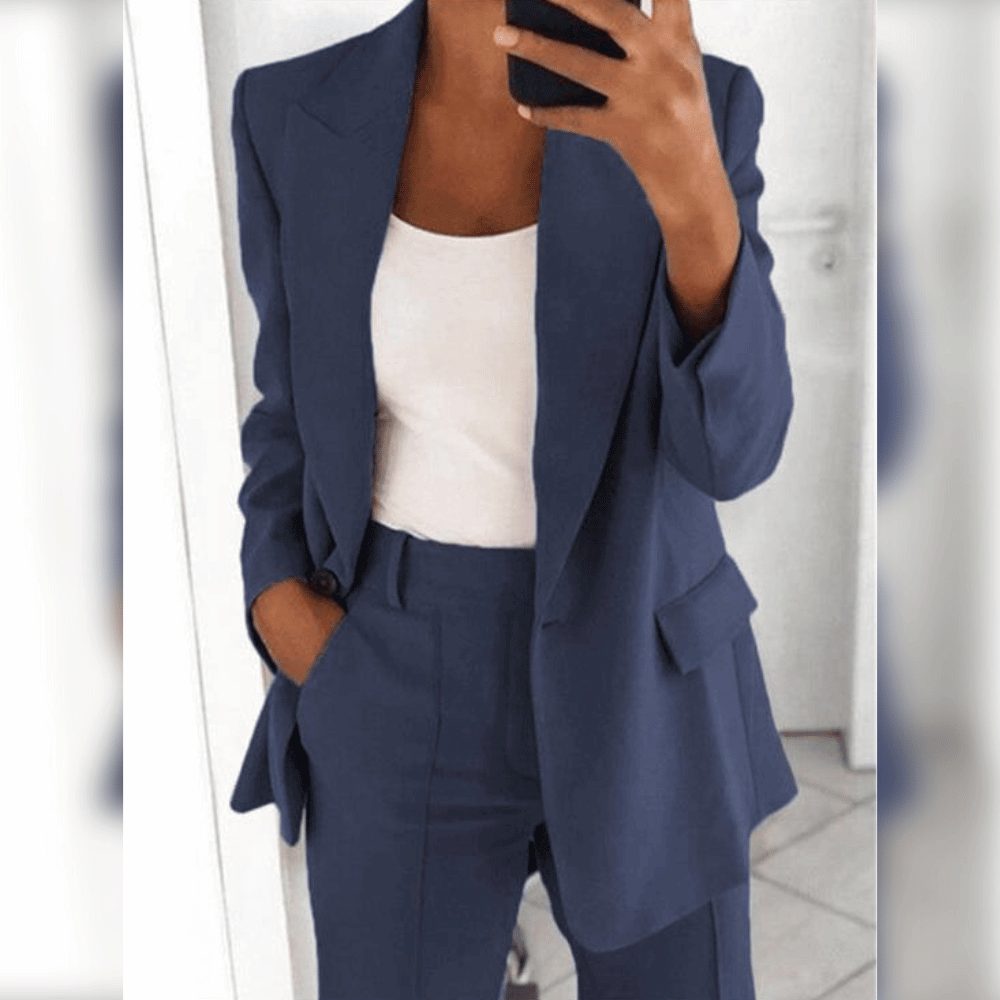 Women's two-piece tailored suit in black and blue, shown with white camisole layered underneath.