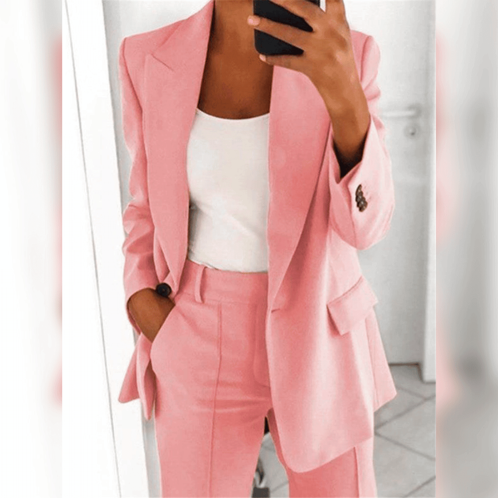 Women's two-piece tailored suit in black and blue, shown with white camisole layered underneath.