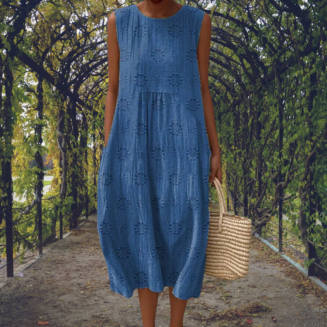 Sleeveless midi dress with raised embroidered dot motifs, round neckline and side pockets
