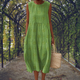 Sleeveless midi dress with raised embroidered dot motifs, round neckline and side pockets