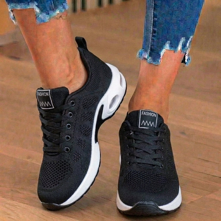 Mesh athletic sneakers with lace-up fronts and thick soles
