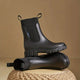 Women's waterproof Chelsea boots with pull tabs and lug sole