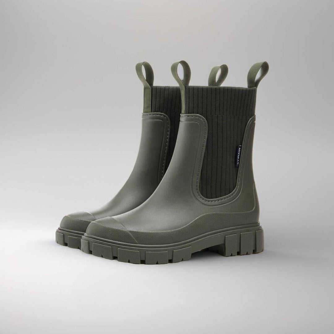 Women's waterproof Chelsea boots with pull tabs and lug sole