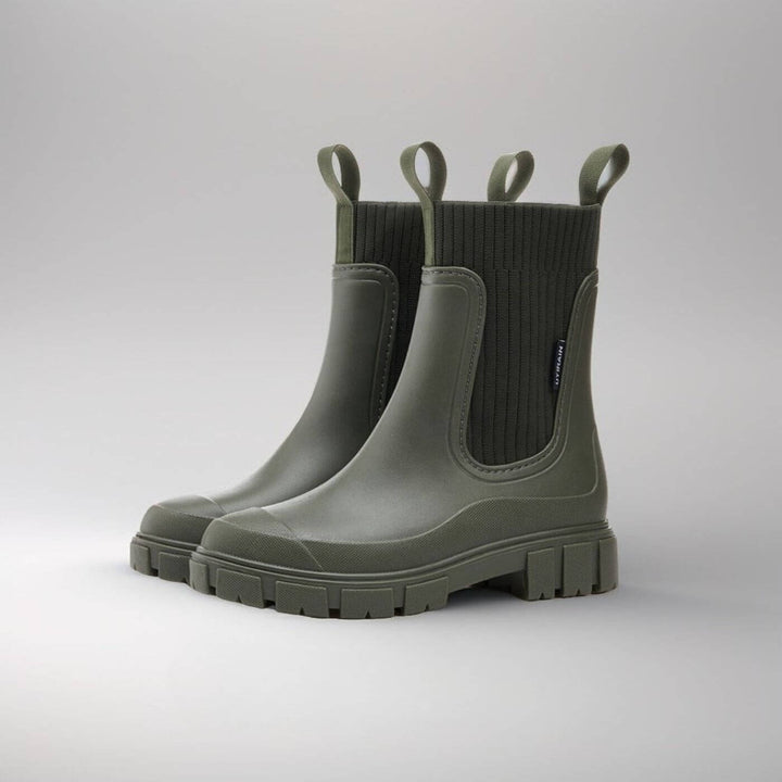 Women's waterproof Chelsea boots with pull tabs and lug sole