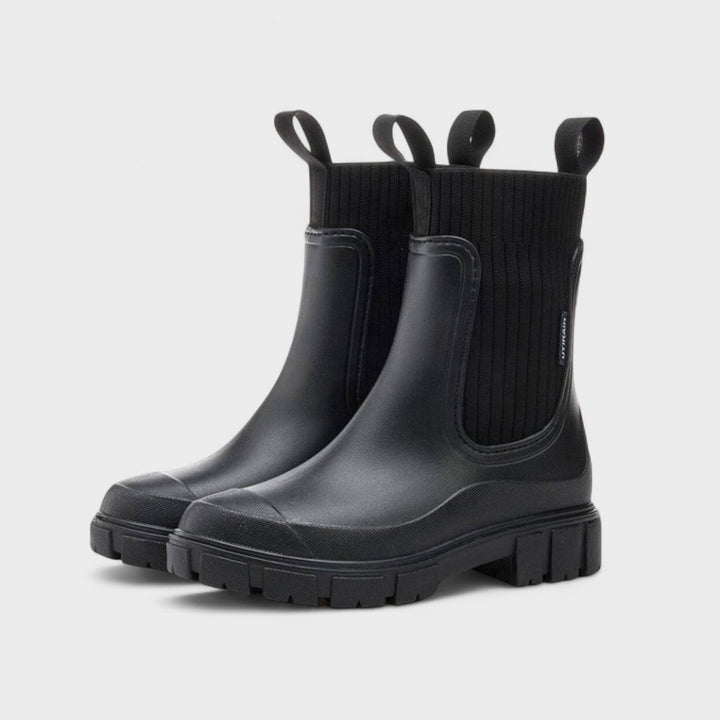 Women's waterproof Chelsea boots with pull tabs and lug sole