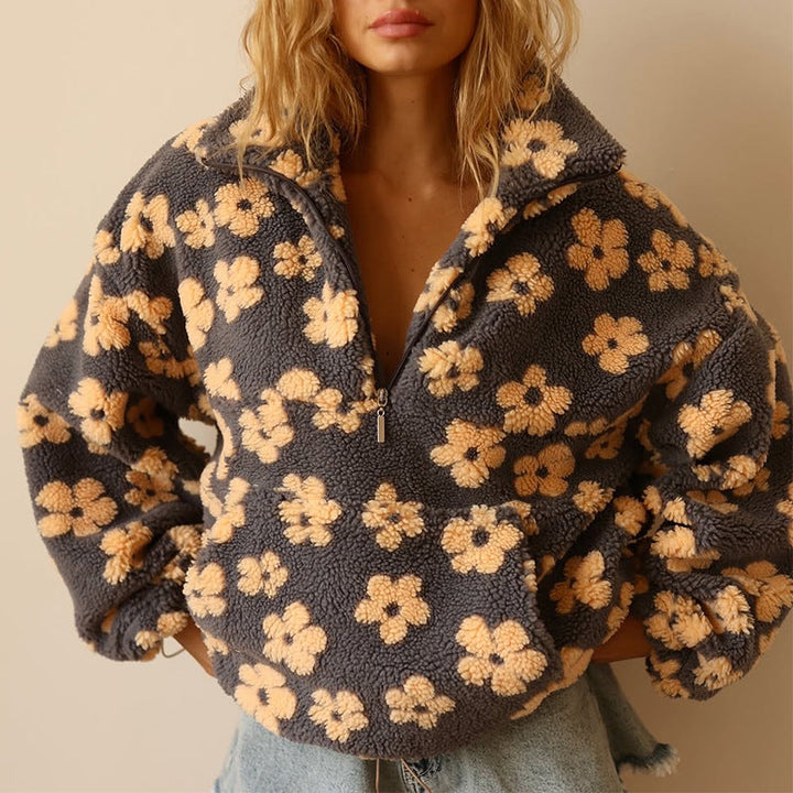 Women's floral half-zip pullover sweater with raised collar