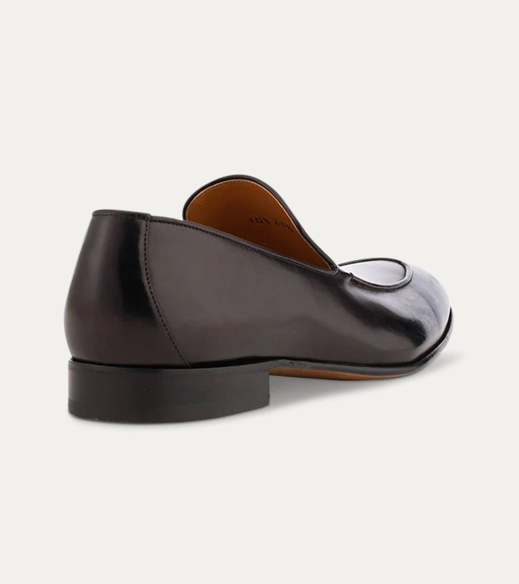 Men's black apron front loafer with pointed toe and low heel