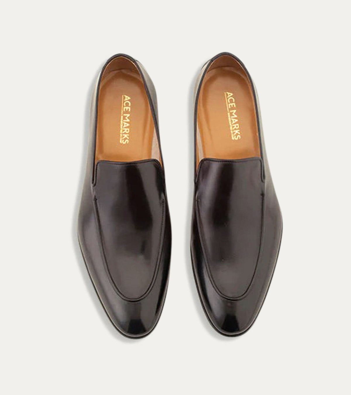 Men's black apron front loafer with pointed toe and low heel