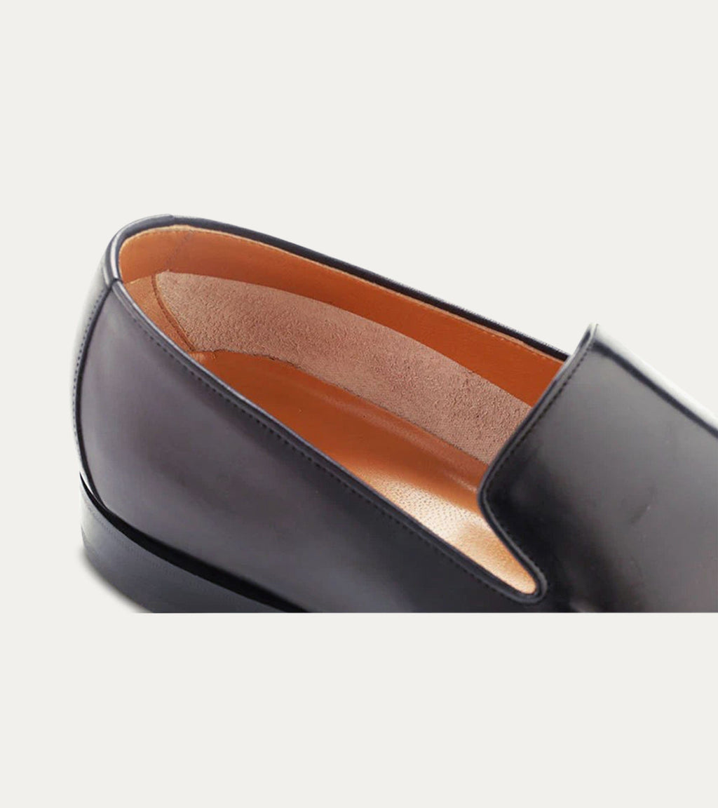 Men's black apron front loafer with pointed toe and low heel