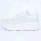 Unisex black lace-up running shoe with thick sculpted sole