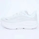 Unisex black lace-up running shoe with thick sculpted sole