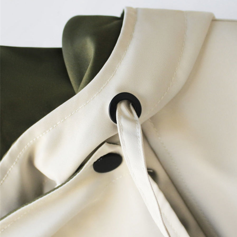 Women's lightweight windbreaker jacket with oversized colour-block collar and button front