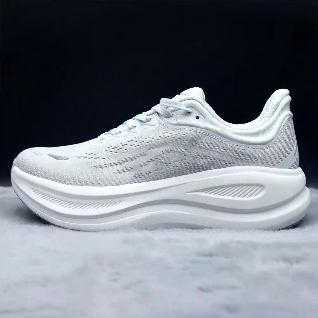 Unisex black lace-up running shoe with thick sculpted sole