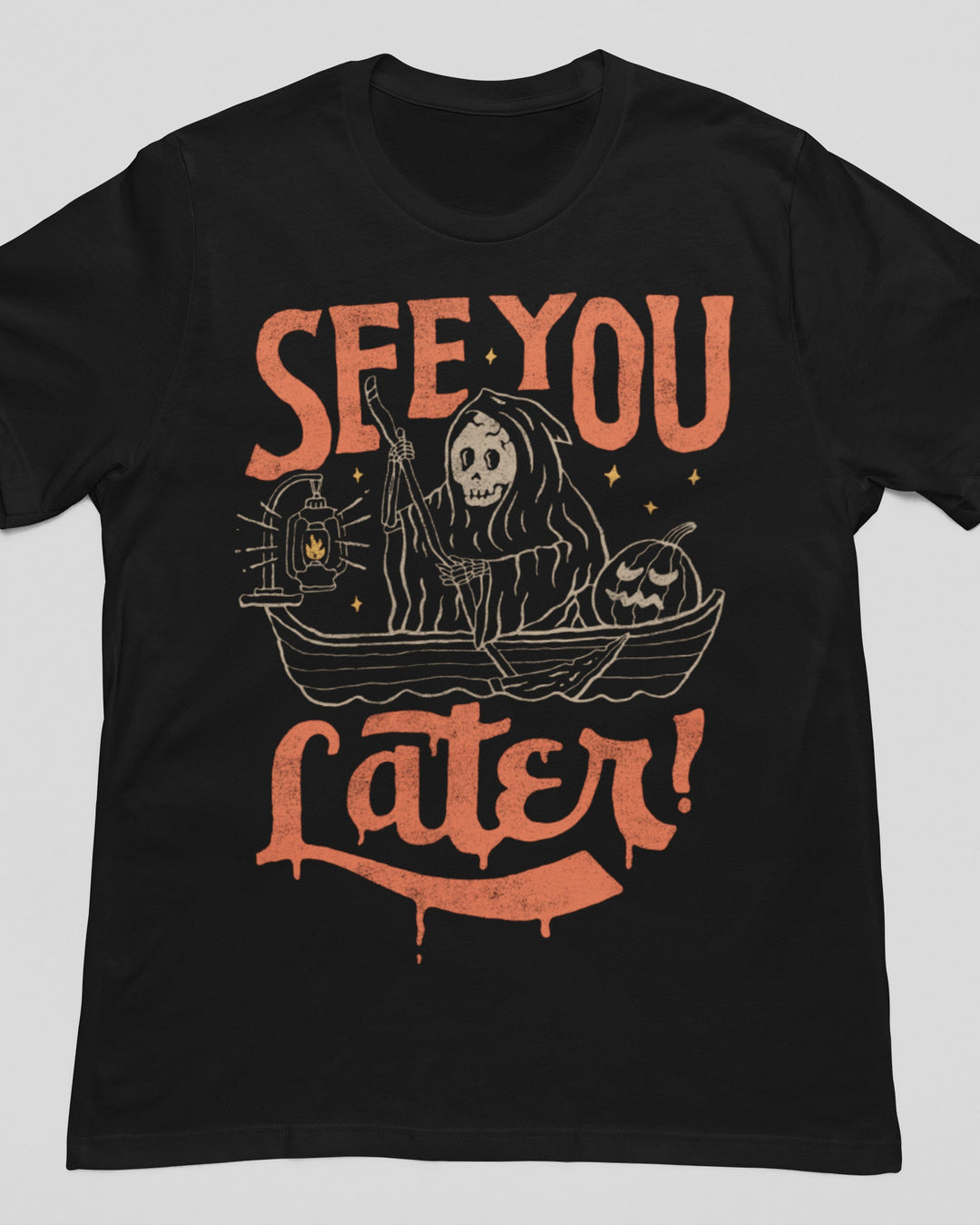 Black crew neck t-shirt with orange and cream graphic print of hooded figure in boat