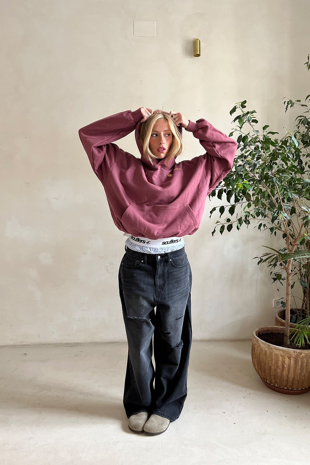 Women's hooded sweatshirt with chest graphics and kangaroo pocket