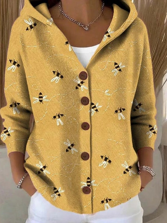 Women's patchwork hooded cardigan in multi-colour with button front, worn over white top