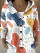 Women's patchwork hooded cardigan in multi-colour with button front, worn over white top