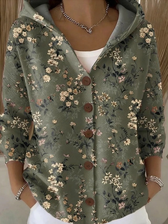 Women's patchwork hooded cardigan in multi-colour with button front, worn over white top