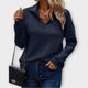 Women's ribbed half-zip sweater with raised mock collar