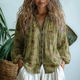 Women's relaxed long sleeve button-down blouse with floral print and decorative braid trim