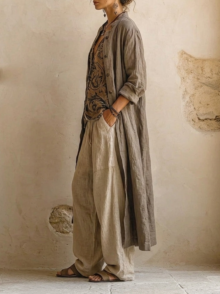 Women's three-piece set with grey-brown button shirt, patterned wrap top, and cream wide-leg trousers