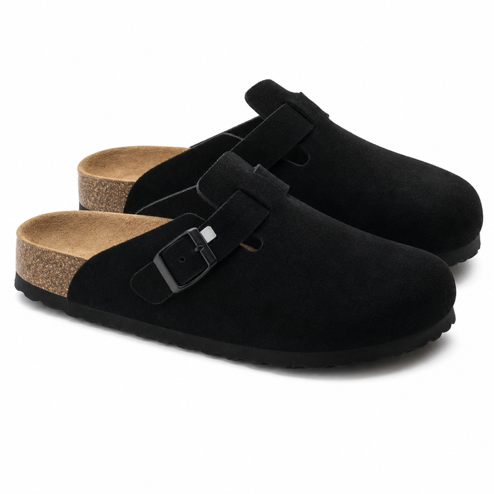 Unisex Positano clog mule with buckle strap, cork insole and black padded sole, shown in taupe and black.