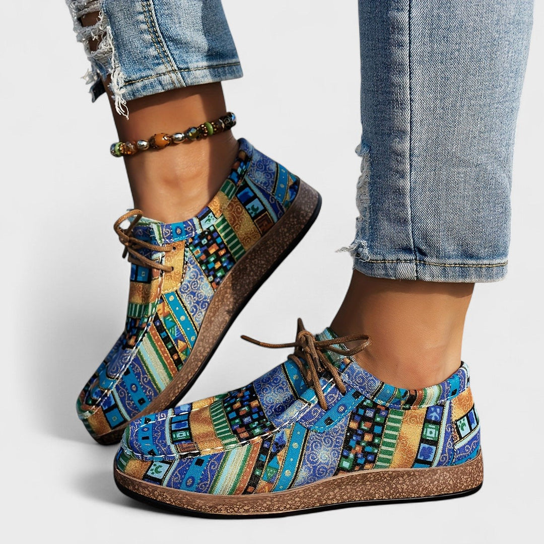 Patterned canvas lace-up trainers with a speckled flatform sole