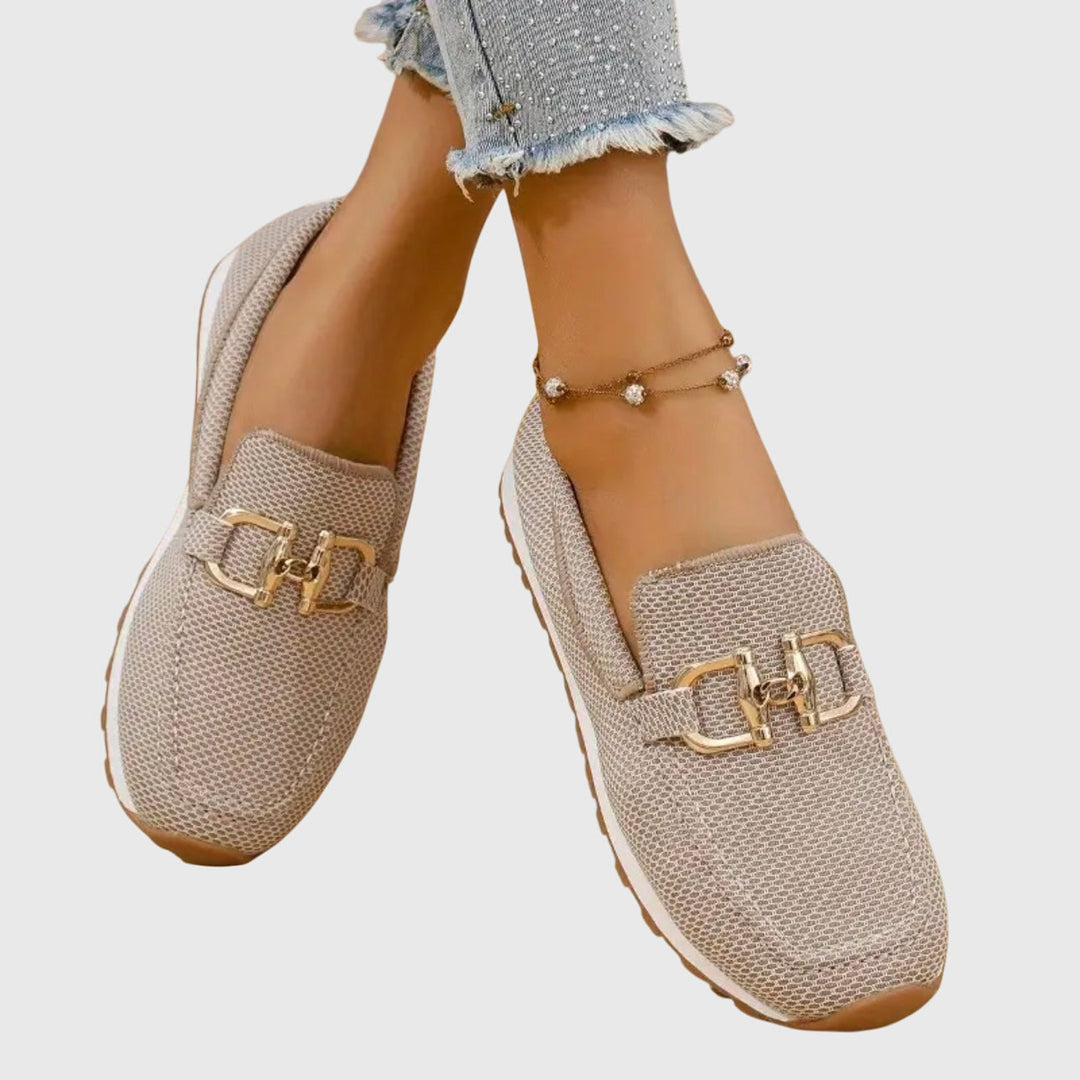 Orthopedic loafer sneakers with round toes and metal buckle detail