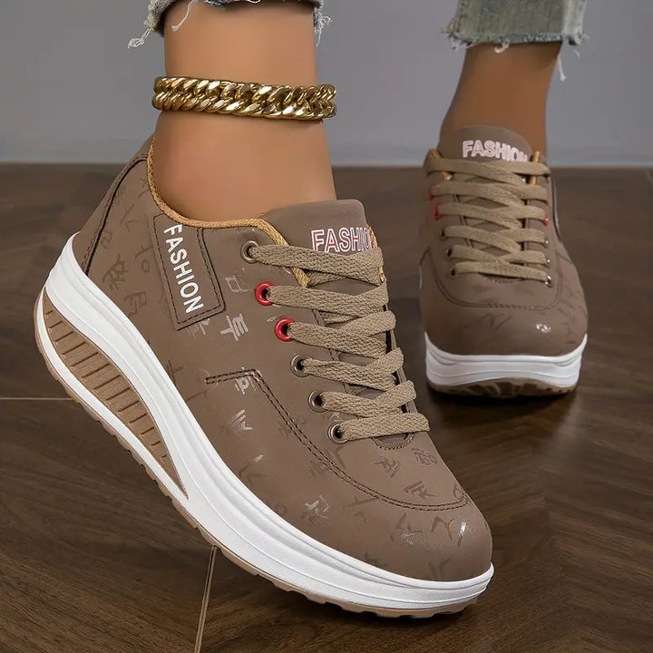 Women's low-top lace-up sneakers with printed uppers and raised soles